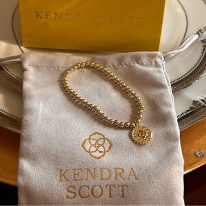Kendra Scott Gold Beaded Bracelet with a circular KS Signature pendant NEW